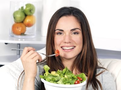 beautiful girl eating healthy food